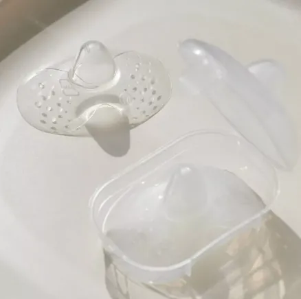 Protectoare mameloane MAM, marimea L, 2 buc. Protectoare mameloane MAM, marimea L, 2 buc.