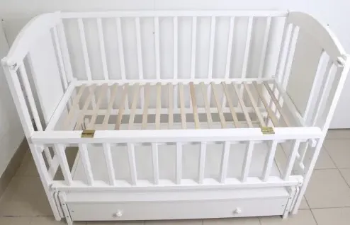 Pătuț Kuzya Elefant Alb pe balansoar cu sertar Pătuț Kuzya Elefant Alb pe balansoar cu sertar