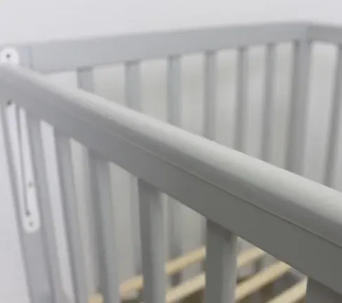 Pătuț Kuzya Sofia Gri pe balansoar cu sertar Pătuț Kuzya Sofia Gri pe balansoar cu sertar