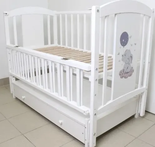 Pătuț Kuzya Elefant Alb pe balansoar cu sertar Pătuț Kuzya Elefant Alb pe balansoar cu sertar