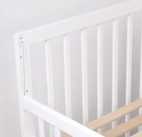 Pătuț Kuzya Sofia Alb cu sertar pe balansoar Pătuț Kuzya Sofia Alb cu sertar pe balansoar