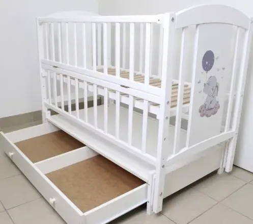 Pătuț Kuzya Elefant Alb pe balansoar cu sertar Pătuț Kuzya Elefant Alb pe balansoar cu sertar